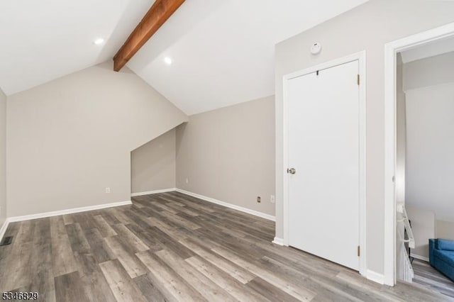 4 Village Way Unit 3, Vernon Twp, NJ 07462 - additional living space with visible vents, lofted ceiling with beams, baseboards, and wood finished floors