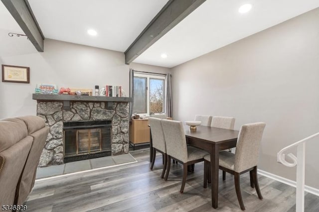 4 Village Way Unit 3, Vernon Twp, NJ 07462 - dining space with recessed lighting, baseboards, beam ceiling, a stone fireplace, and wood finished floors