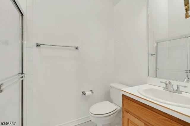 full bathroom with a shower with door, toilet, and vanity