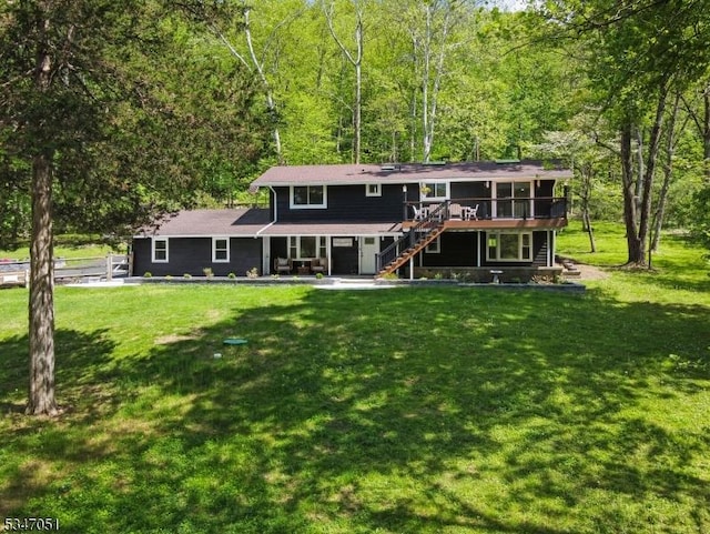159 Musconetcong River Rd, Lebanon Twp, NJ 07882 - rear view of property with a wooden deck, stairs, a forest view, and a yard