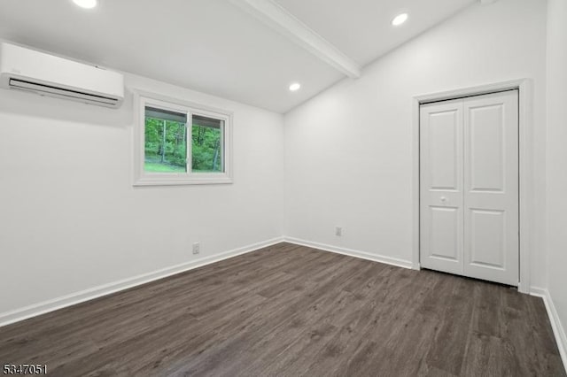 159 Musconetcong River Rd, Lebanon Twp, NJ 07882 - unfurnished bedroom with a wall unit AC, dark wood-style flooring, baseboards, recessed lighting, and a closet