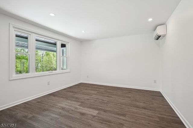 159 Musconetcong River Rd, Lebanon Twp, NJ 07882 - spare room with a wall mounted air conditioner, dark wood-type flooring, baseboards, and recessed lighting