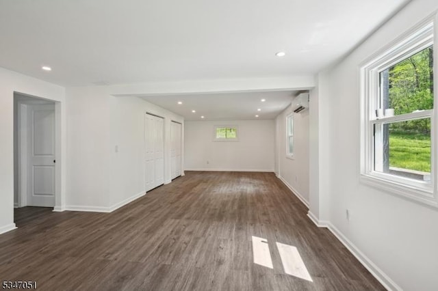 159 Musconetcong River Rd, Lebanon Twp, NJ 07882 - spare room with dark wood-type flooring, baseboards, an AC wall unit, and recessed lighting