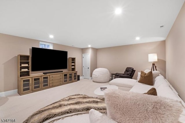 carpeted living room featuring recessed lighting