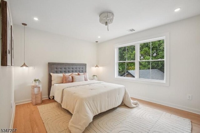 39 Walnut Cres, Montclair Twp, NJ 07042 - bedroom with light wood-type flooring, baseboards, and recessed lighting