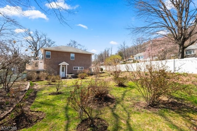 134 Cedar Grove Pkwy, Cedar Grove Twp, NJ 07009 - rear view of house featuring fence