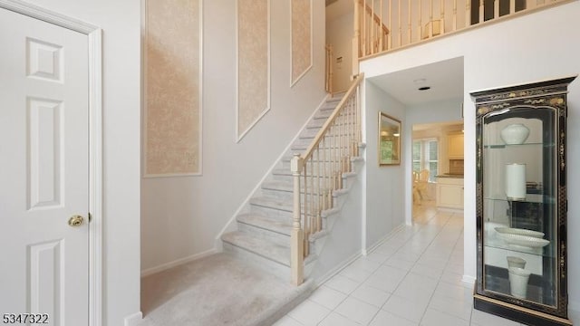 19 Trails End Ct, Westfield Town, NJ 07090 - staircase featuring baseboards and tile patterned floors