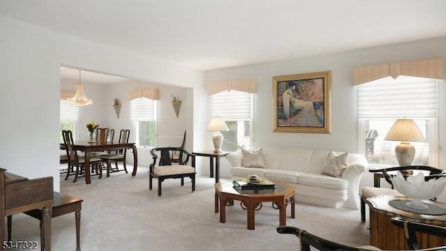 19 Trails End Ct, Westfield Town, NJ 07090 - living area featuring light colored carpet and a chandelier