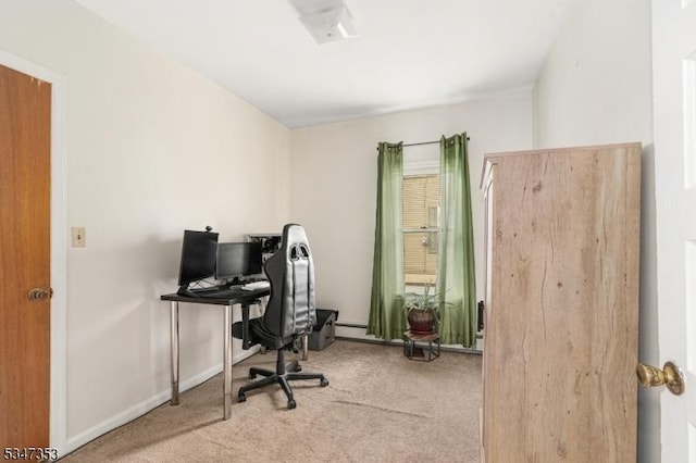 office area featuring baseboards and carpet flooring