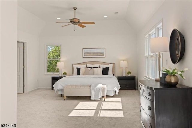 bedroom featuring lofted ceiling, baseboards, light colored carpet, recessed lighting, and a ceiling fan