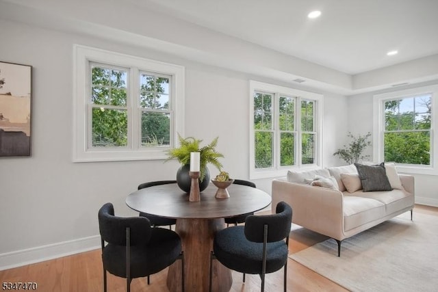 interior space featuring baseboards, recessed lighting, and light wood-style flooring