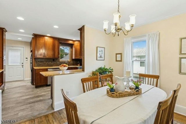 577-9 Greenbrook Rd, North Plainfield Boro, NJ 07063 - dining room with light wood-type flooring, a chandelier, healthy amount of natural light, recessed lighting, and baseboards