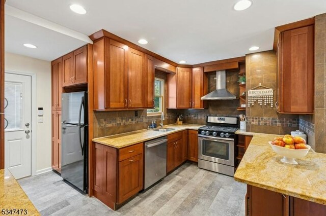 577-9 Greenbrook Rd, North Plainfield Boro, NJ 07063 - kitchen with wall chimney range hood, appliances with stainless steel finishes, light wood-style floors, a sink, and recessed lighting