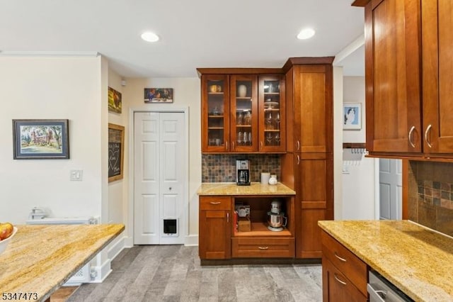 577-9 Greenbrook Rd, North Plainfield Boro, NJ 07063 - kitchen with light stone counters, tasteful backsplash, glass insert cabinets, light wood finished floors, and recessed lighting