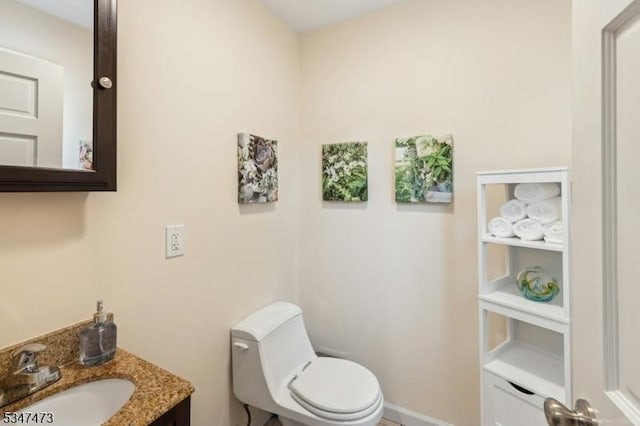 577-9 Greenbrook Rd, North Plainfield Boro, NJ 07063 - half bathroom featuring toilet, vanity, and baseboards