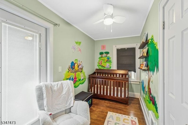 577-9 Greenbrook Rd, North Plainfield Boro, NJ 07063 - bedroom featuring ornamental molding, wood finished floors, baseboards, ceiling fan, and a nursery area