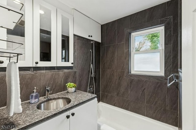 577-9 Greenbrook Rd, North Plainfield Boro, NJ 07063 - bathroom with tasteful backsplash, vanity, and  shower combination