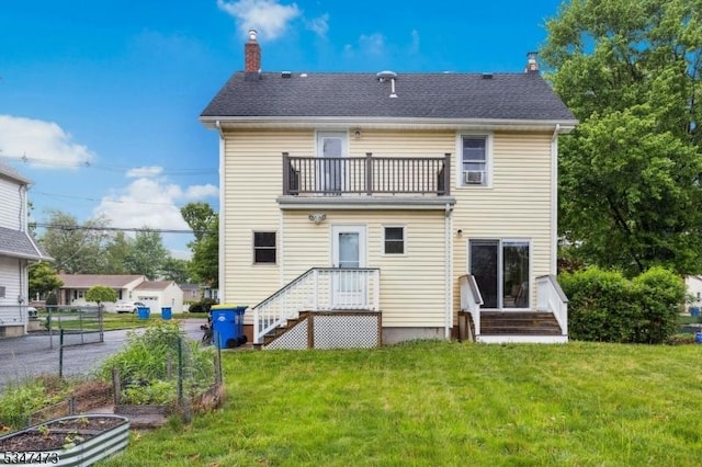 577-9 Greenbrook Rd, North Plainfield Boro, NJ 07063 - rear view of house featuring a balcony, a chimney, a yard, and a vegetable garden