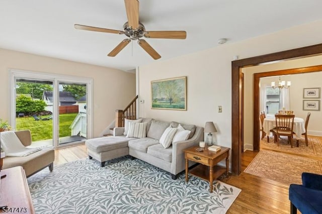 577-9 Greenbrook Rd, North Plainfield Boro, NJ 07063 - living area with a chandelier, light wood-style floors, and ceiling fan