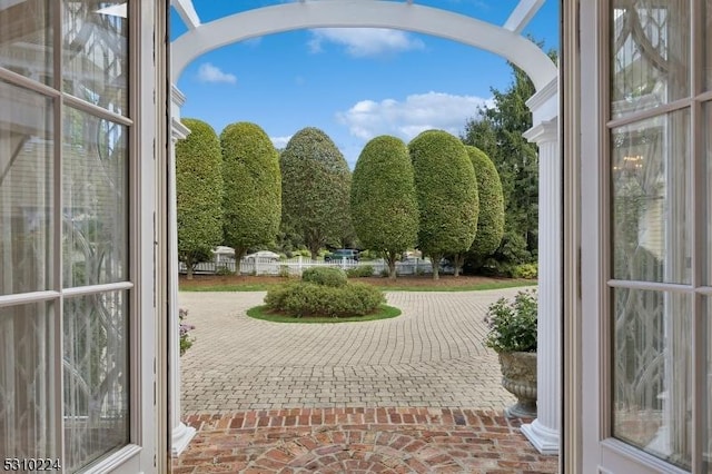 surrounding community with a patio area