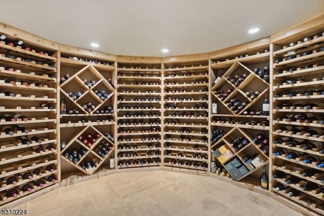 wine area with electric panel and recessed lighting