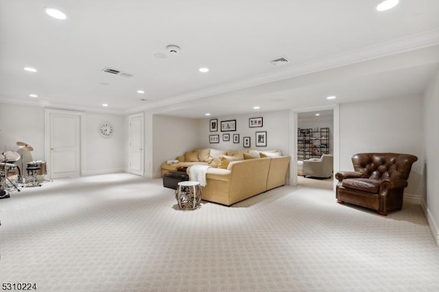 carpeted living area featuring recessed lighting, visible vents, baseboards, and crown molding