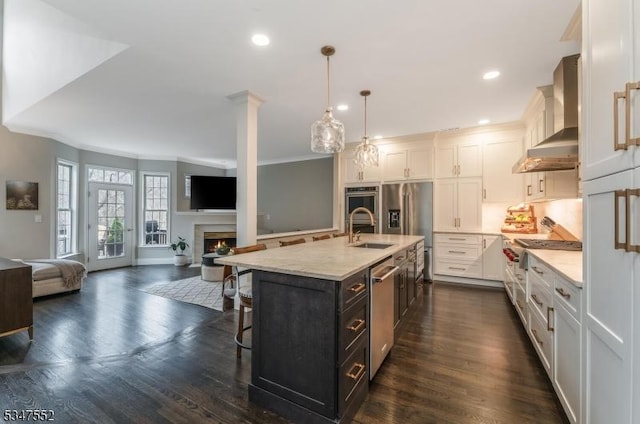 10 Rock Creek Woods Dr, Lambertville City, NJ 08530 - kitchen featuring crown molding, wall chimney range hood, a kitchen bar, white cabinets, and appliances with stainless steel finishes