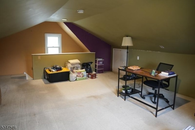 bonus room featuring vaulted ceiling and carpet flooring