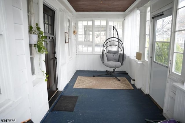 sunroom featuring a wealth of natural light