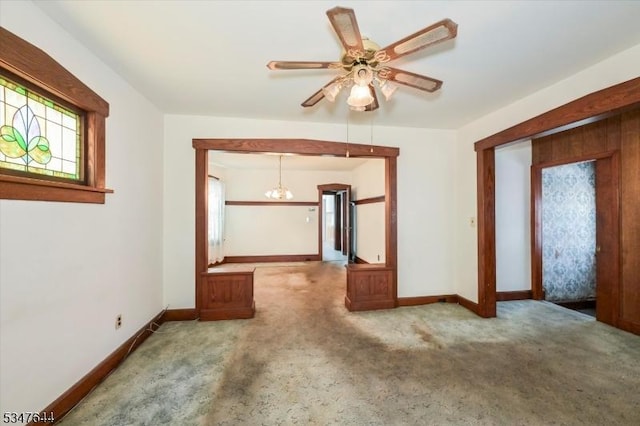 unfurnished room featuring baseboards, carpet flooring, and healthy amount of natural light