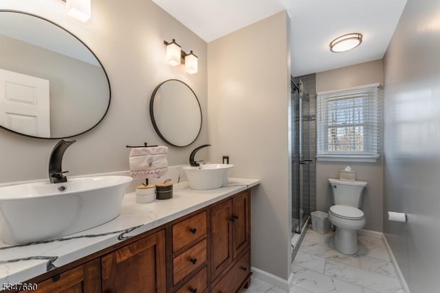 bathroom featuring walk in shower, marble finish floor, baseboards, and a sink