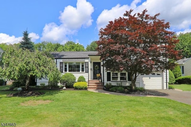 2379 Bryant Ave, Scotch Plains Twp, NJ 07076 - view of property hidden behind natural elements featuring asphalt driveway and a front yard