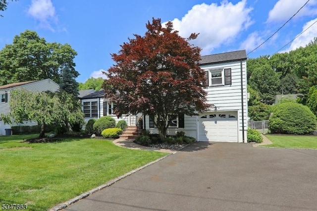 2379 Bryant Ave, Scotch Plains Twp, NJ 07076 - obstructed view of property with driveway and a garage