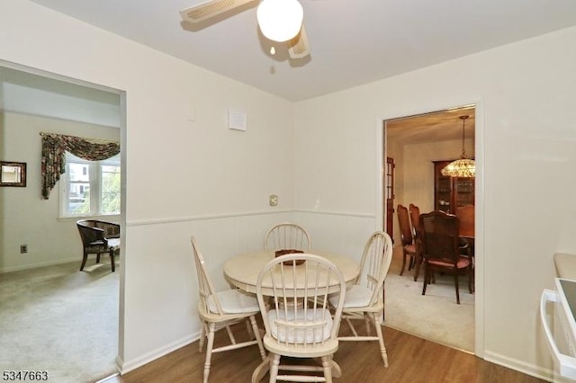 2379 Bryant Ave, Scotch Plains Twp, NJ 07076 - dining area featuring a chandelier, ceiling fan, and wood finished floors