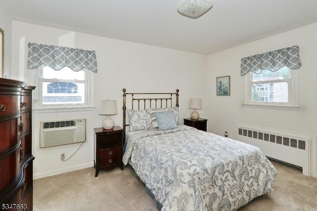2379 Bryant Ave, Scotch Plains Twp, NJ 07076 - bedroom featuring radiator heating unit, light colored carpet, and a wall mounted AC