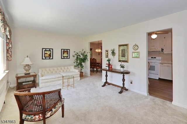 2379 Bryant Ave, Scotch Plains Twp, NJ 07076 - living area featuring light colored carpet and a chandelier