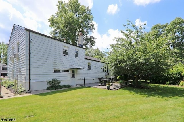 2379 Bryant Ave, Scotch Plains Twp, NJ 07076 - rear view of property with a patio area and a chimney