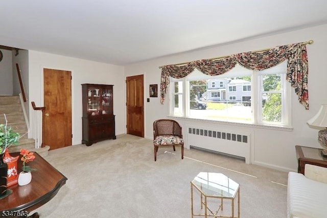 2379 Bryant Ave, Scotch Plains Twp, NJ 07076 - sitting room featuring radiator, stairway, and carpet floors