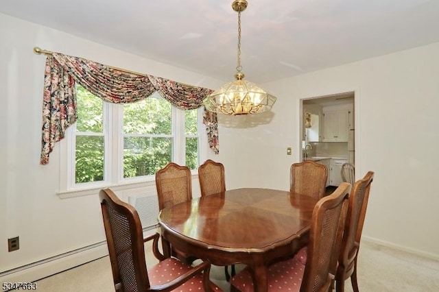 2379 Bryant Ave, Scotch Plains Twp, NJ 07076 - dining space featuring a baseboard radiator, a chandelier, and carpet