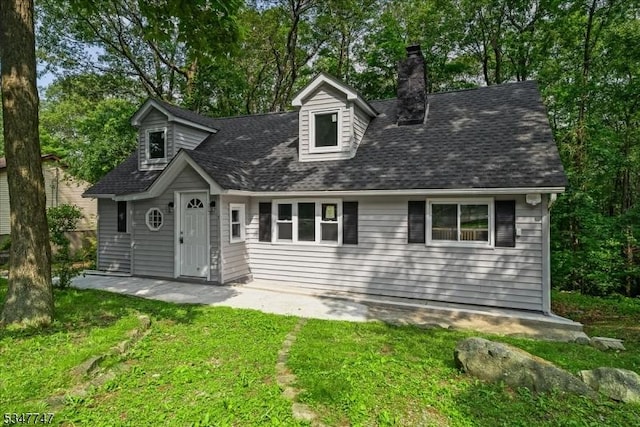 7 Mondamin Rd, Vernon Twp, NJ 07422 - cape cod-style house with a front lawn, a chimney, and a shingled roof