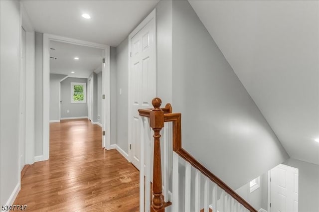 7 Mondamin Rd, Vernon Twp, NJ 07422 - corridor with light wood finished floors, an upstairs landing, and recessed lighting