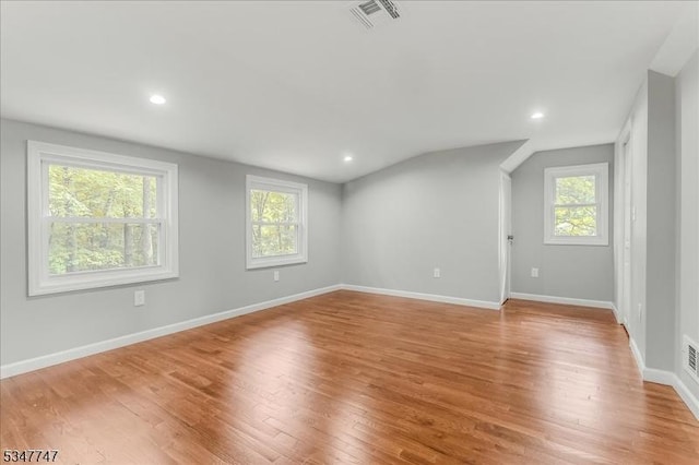 7 Mondamin Rd, Vernon Twp, NJ 07422 - spare room featuring light wood-type flooring, vaulted ceiling, and recessed lighting