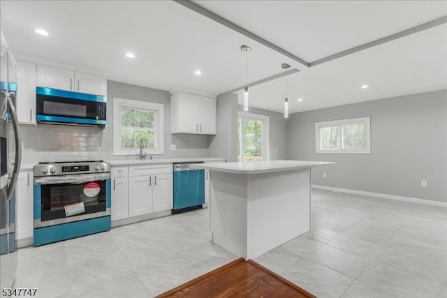 7 Mondamin Rd, Vernon Twp, NJ 07422 - kitchen with stainless steel appliances, plenty of natural light, backsplash, white cabinetry, and recessed lighting