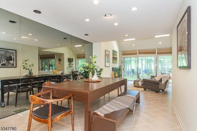 204 Barringer Ct, West Orange Twp, NJ 07052 - dining space featuring recessed lighting, plenty of natural light, and light tile patterned floors