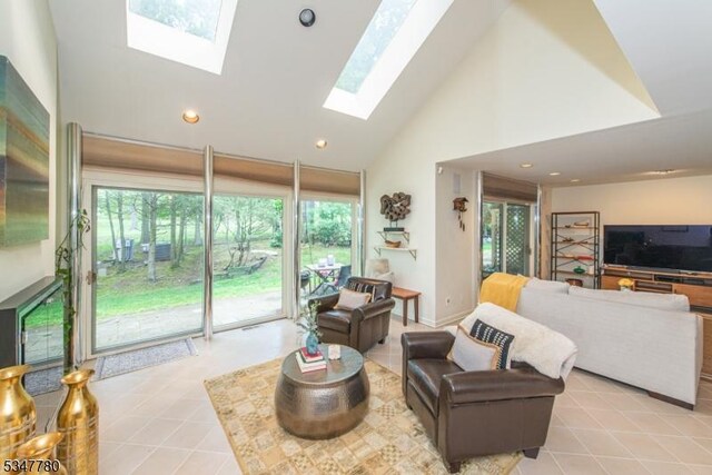 204 Barringer Ct, West Orange Twp, NJ 07052 - living room featuring high vaulted ceiling, a skylight, recessed lighting, and light tile patterned flooring