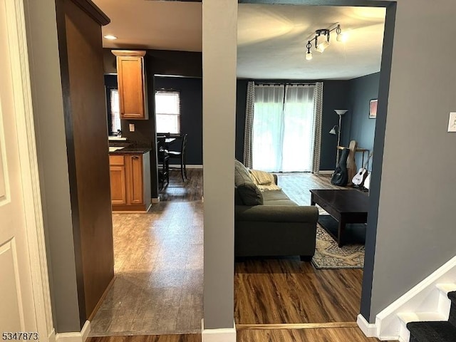 913 Renate Dr Unit 2, Hillsborough Twp, NJ 08844 - living room with wood finished floors, baseboards, and stairs