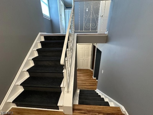 913 Renate Dr Unit 2, Hillsborough Twp, NJ 08844 - stairway with wood finished floors and baseboards