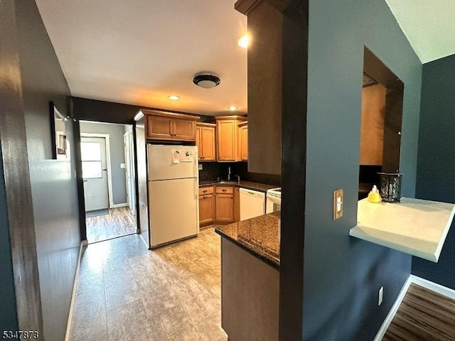 913 Renate Dr Unit 2, Hillsborough Twp, NJ 08844 - kitchen featuring white appliances, baseboards, dark countertops, a sink, and recessed lighting