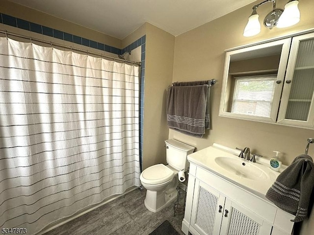 913 Renate Dr Unit 2, Hillsborough Twp, NJ 08844 - bathroom with toilet, vanity, wood finished floors, and curtained shower