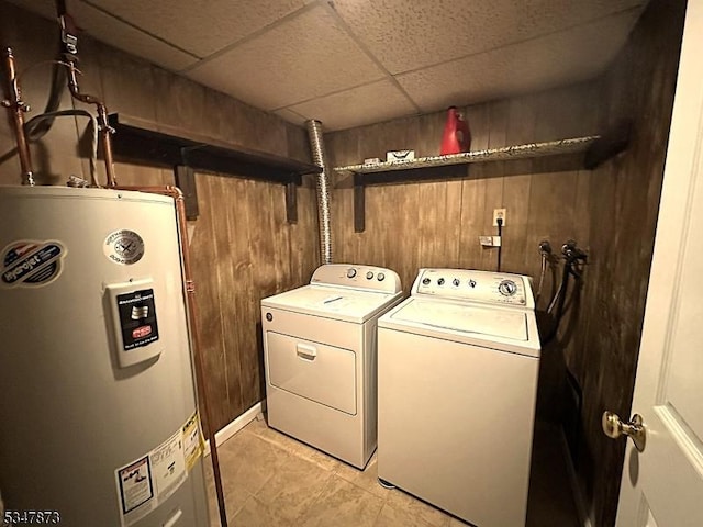 913 Renate Dr Unit 2, Hillsborough Twp, NJ 08844 - laundry area featuring electric water heater, wood walls, independent washer and dryer, and light tile patterned floors
